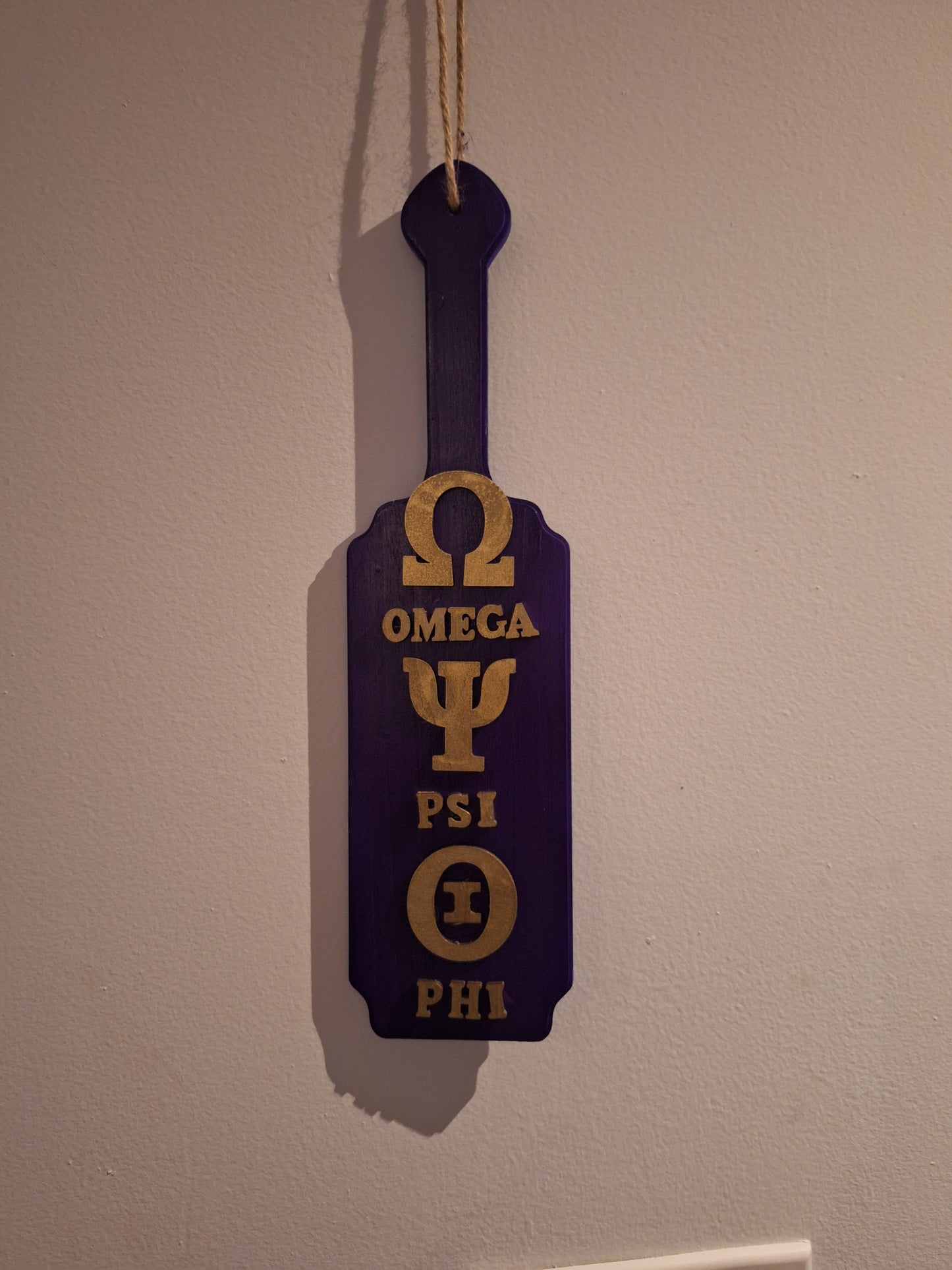 “Omega Pride Paddle”  Size: 15 inches Theme Colors: Royal Purple & Metallic Gold