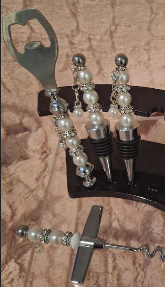 Pearl bottle opener, cork remover, and bottle stoppers