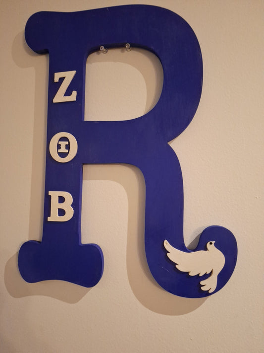 Celebrate the legacy and sisterhood of Zeta Phi Beta Sorority, Inc. with this handcrafted 18-inch letter R, beautifully designed in the signature royal blue and white colors.
